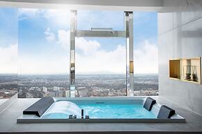 Apartments in Sky Tower with Bathtub near the window