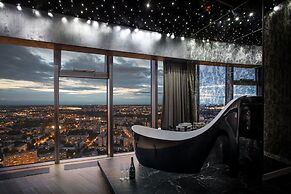 Apartments in Sky Tower with Bathtub near the window