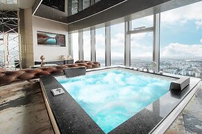 Apartments in Sky Tower with Bathtub near the window