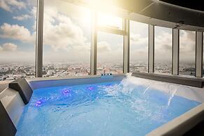 Apartments in Sky Tower with Bathtub near the window