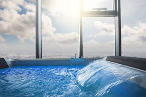 Apartments in Sky Tower with Bathtub near the window