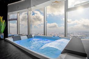 Apartments in Sky Tower with Bathtub near the window