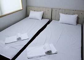 The Style Capsule Guesthouse - Hostel