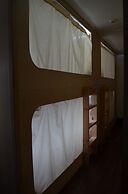 The Style Capsule Guesthouse - Hostel