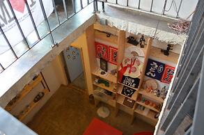 The Style Capsule Guesthouse - Hostel