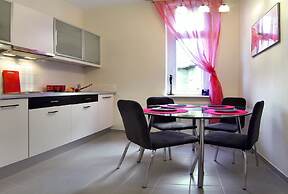 Apartamenty Pomarańczarnia