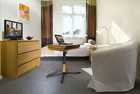 Apartamenty Pomarańczarnia