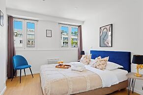 Charming 2BR Retreat by République