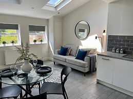 Woolton Retreat Skylights Desk Parking