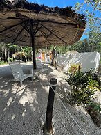 Cenote Escondido - Cabañas y Camping