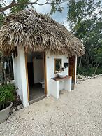 Cenote Escondido - Cabañas y Camping