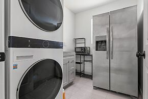 Spacious 8BR Home with AC & Parking