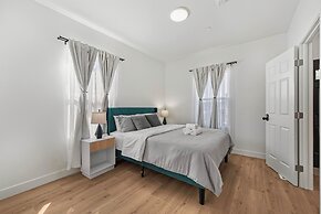 Spacious 8BR Home with AC & Parking