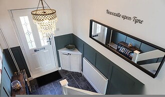 Spacious 4BR Newcastle Home Sleeps 7