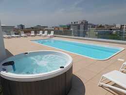 Contemporary Seafront Complex With Pool