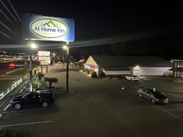 At Home Inn & Suites