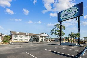 At Home Inn & Suites