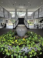 At Home Inn & Suites