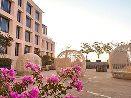 Grand Millennium Muscat connected to Muscat Grand Mall