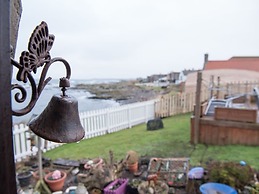 Pew With a View - Seafront Cottages