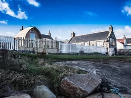Pew With a View - Seafront Cottages