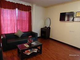 RueMango Apartelle and Suites