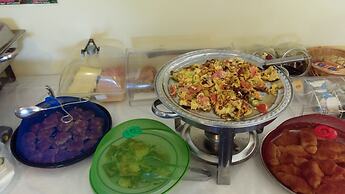 Saint George Hotel & Rooms