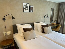 De Zon Hotel & Restaurant by Flow