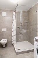 Golden Roof Apartments by Penz