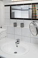 Golden Roof Apartments by Penz