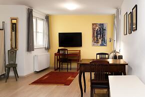 Golden Roof Apartments by Penz