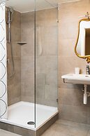 Golden Roof Apartments by Penz