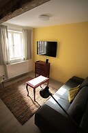 Golden Roof Apartments by Penz