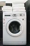 Golden Roof Apartments by Penz