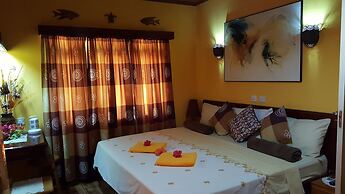 Anse Kerlan Beach Chalets