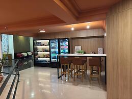 Le Village Flats e Hotel