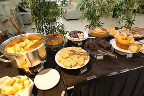 Le Village Flats e Hotel