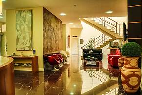 Le Village Flats e Hotel