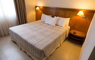 Le Village Flats e Hotel