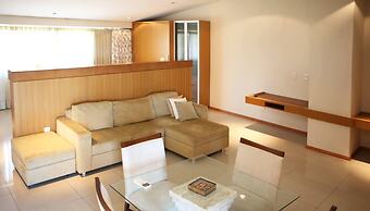 Le Village Flats e Hotel