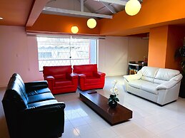 Le Village Flats e Hotel