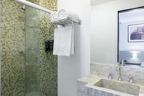 Le Village Flats e Hotel