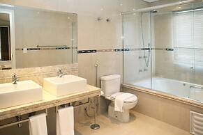 Le Village Flats e Hotel