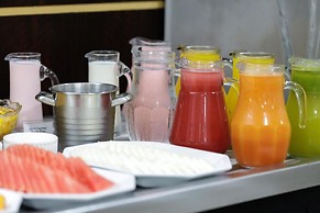 Le Village Flats e Hotel