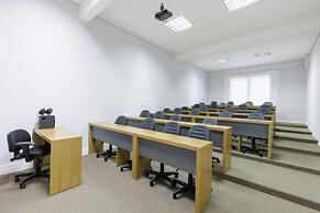 Le Village Flats e Hotel