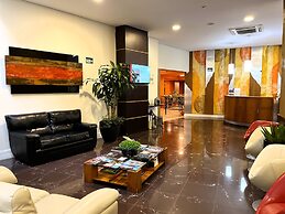 Le Village Flats e Hotel