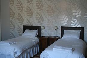 Le Voltaire Chambres et Table d'Hotes