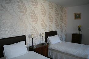 Le Voltaire Chambres et Table d'Hotes