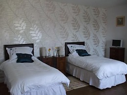 Le Voltaire Chambres et Table d'Hotes