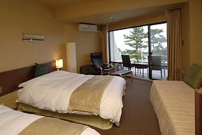 Izukogen Wanwan Paradise Hotel & Cottage